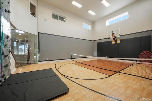 view of basketball court featuring basketball hoop