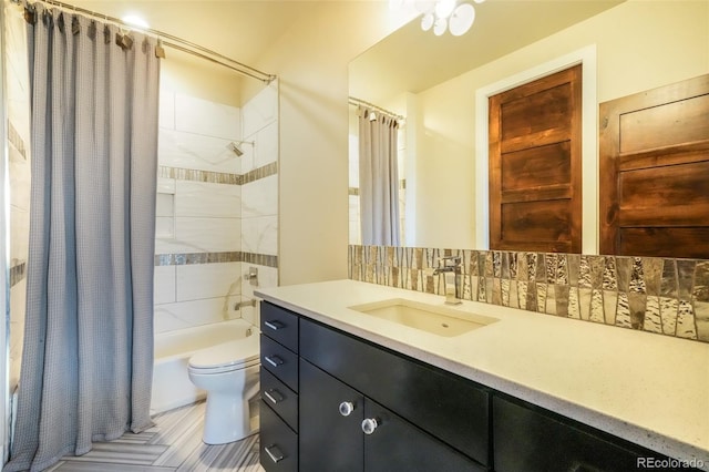 bathroom featuring decorative backsplash, toilet, vanity, and shower / bathtub combination with curtain