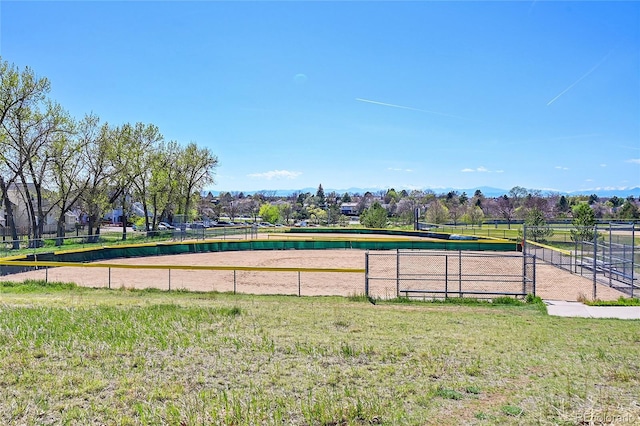 surrounding community featuring fence and volleyball court