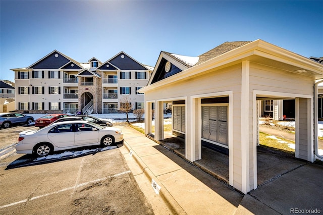 view of front of property with a balcony