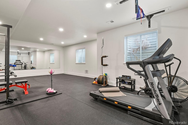 workout area with plenty of natural light, visible vents, baseboards, and recessed lighting