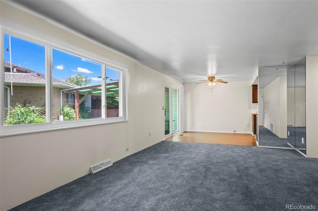 3631 W 79th Ave Unit A2, Westminster, CO 80030 - unfurnished living room with carpet and ceiling fan