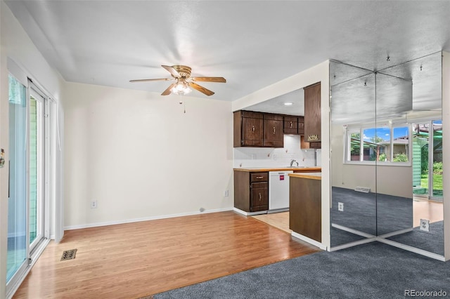 3631 W 79th Ave Unit A2, Westminster, CO 80030 - kitchen featuring dishwasher, dark brown cabinetry, plenty of natural light, and a ceiling fan