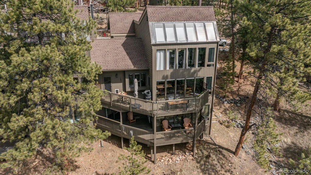 4192 Timbervale Dr, Evergreen, CO 80439 - rear view of house with roof with shingles