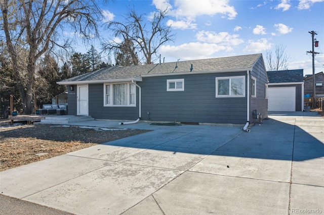 ranch-style house featuring a garage