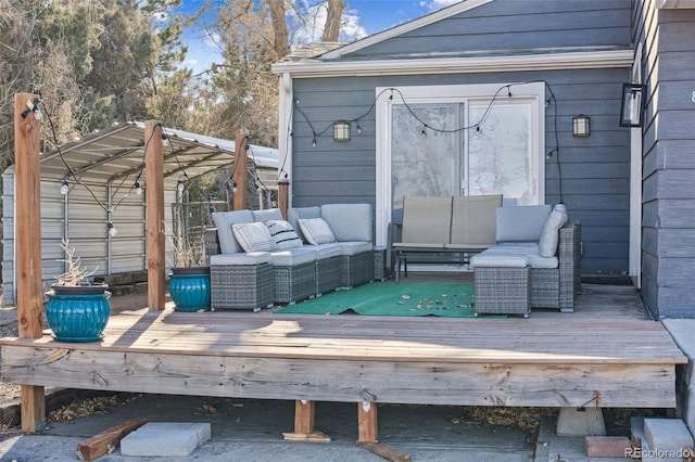 wooden deck featuring an outdoor hangout area