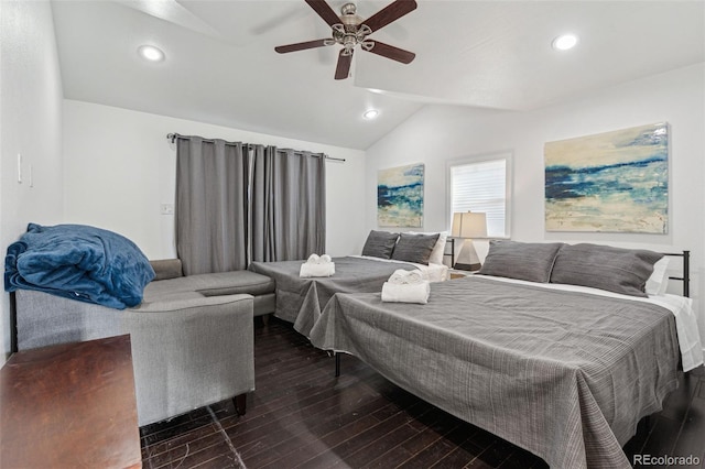 bedroom with lofted ceiling, ceiling fan, and dark hardwood / wood-style flooring