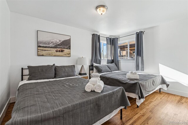 bedroom featuring hardwood / wood-style floors