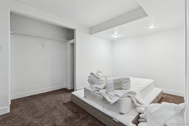 carpeted bedroom featuring a closet