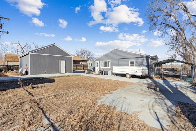 rear view of property featuring a carport