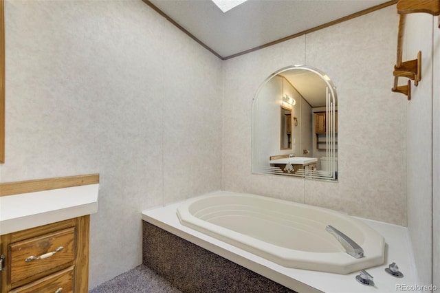 1360 Kiowa Rd, Florissant, CO 80816 - bathroom with a garden tub and ornamental molding