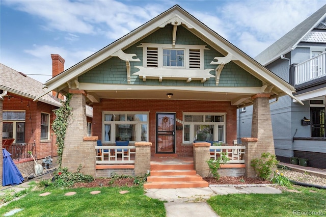 260 N Grant St, Denver, CO 80203 - craftsman inspired home with a porch and brick siding