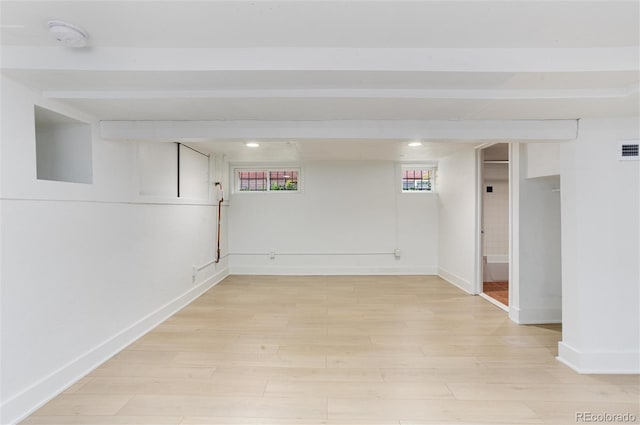 260 N Grant St, Denver, CO 80203 - below grade area with light wood-type flooring and baseboards