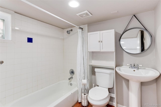 260 N Grant St, Denver, CO 80203 - full bathroom featuring shower / tub combo with curtain, toilet, and a sink