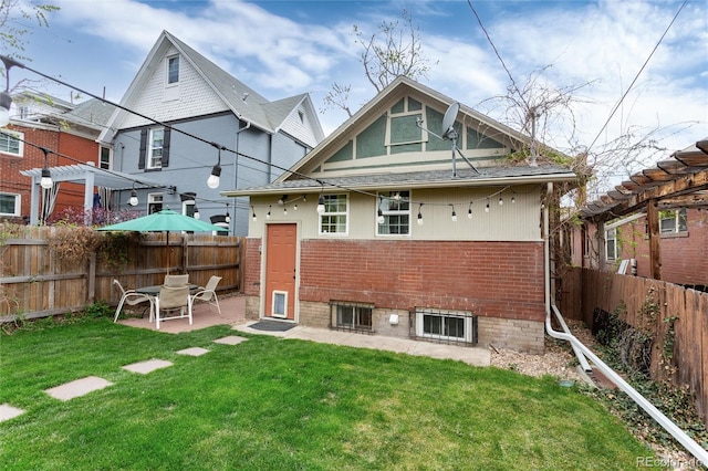 260 N Grant St, Denver, CO 80203 - rear view of house with brick siding, a patio, and a pergola