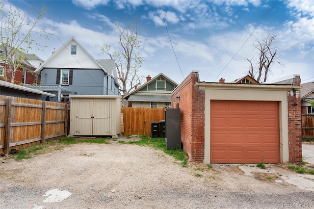 260 N Grant St, Denver, CO 80203 - garage featuring fence and a shed