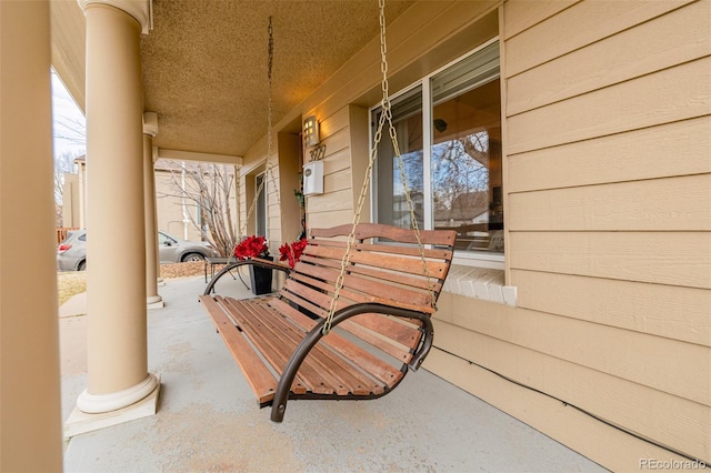 view of patio featuring covered porch