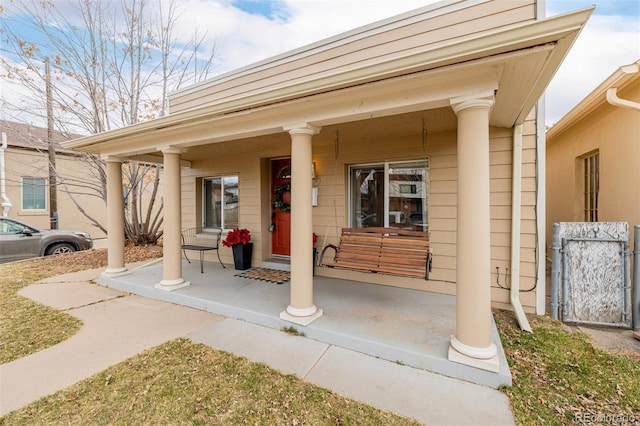 property entrance with a porch