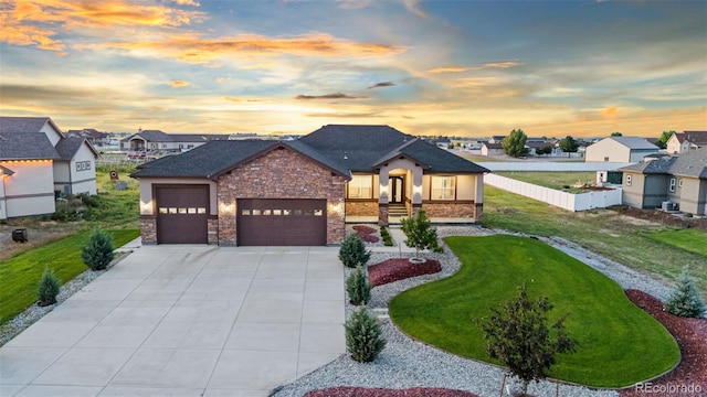 29303 E 165th Ave, Brighton, CO 80603 - view of front of house with an attached garage, driveway, and a residential view