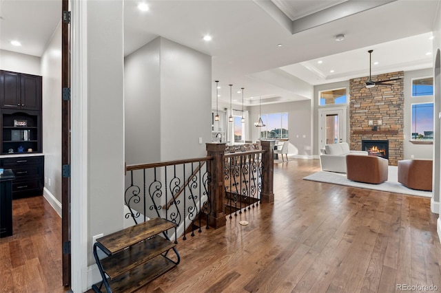 29303 E 165th Ave, Brighton, CO 80603 - hall with hardwood / wood-style flooring, healthy amount of natural light, recessed lighting, and an upstairs landing