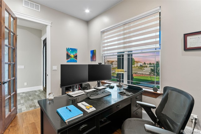 29303 E 165th Ave, Brighton, CO 80603 - home office with french doors, light wood finished floors, and recessed lighting