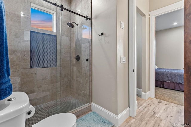 29303 E 165th Ave, Brighton, CO 80603 - ensuite bathroom with a shower stall and wood finished floors
