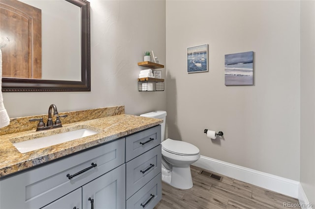29303 E 165th Ave, Brighton, CO 80603 - bathroom with vanity and wood finished floors
