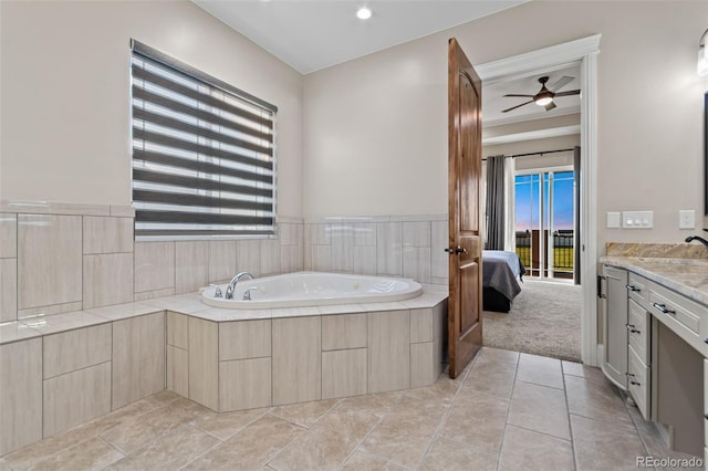 29303 E 165th Ave, Brighton, CO 80603 - ensuite bathroom featuring vanity, a ceiling fan, a bath, and tile patterned floors