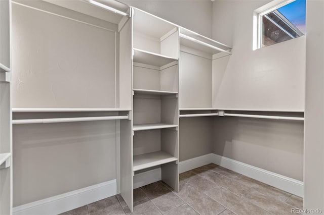 29303 E 165th Ave, Brighton, CO 80603 - spacious closet featuring tile patterned floors