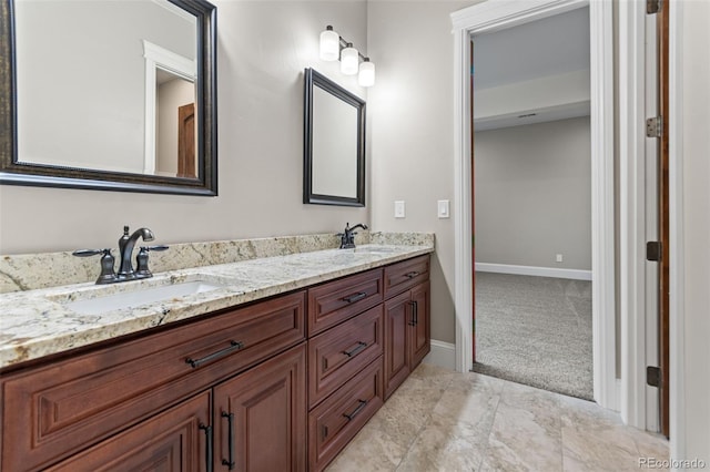 29303 E 165th Ave, Brighton, CO 80603 - full bath featuring double vanity and baseboards