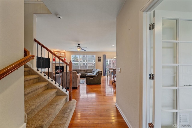 6461 S Ider St, Aurora, CO 80016 - hall with hardwood / wood-style flooring and stairs