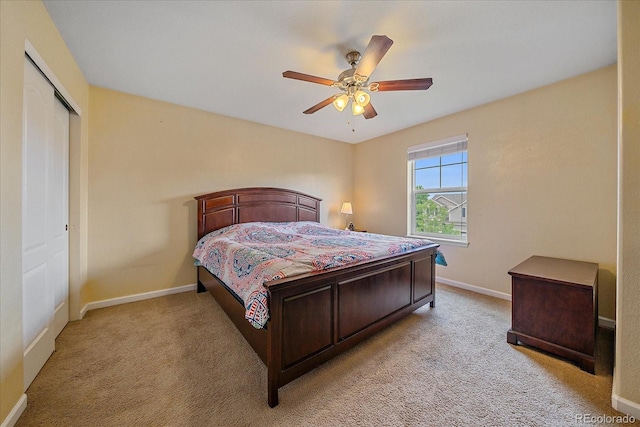 6461 S Ider St, Aurora, CO 80016 - bedroom with light carpet, a closet, and baseboards