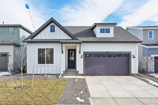 view of front facade with a front yard and a garage