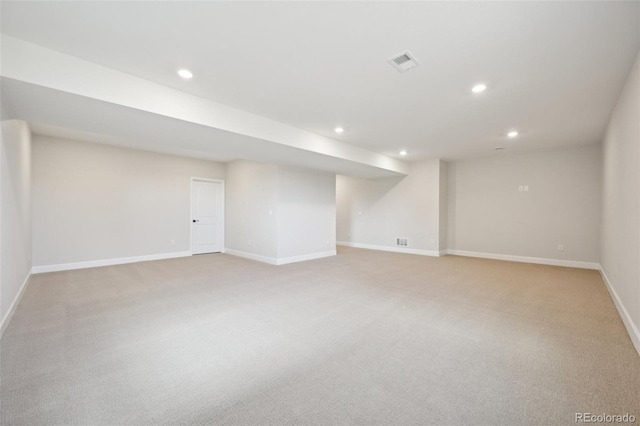 basement with light colored carpet