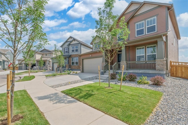 954 Plum Creek Ct, Brighton, CO 80601 - craftsman inspired home with driveway, a residential view, an attached garage, stone siding, and covered porch