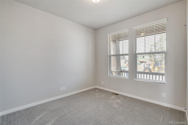 954 Plum Creek Ct, Brighton, CO 80601 - carpeted spare room with baseboards