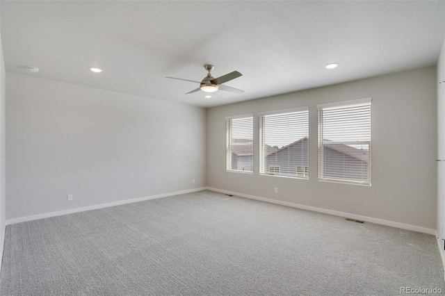 954 Plum Creek Ct, Brighton, CO 80601 - unfurnished room with a ceiling fan, light colored carpet, recessed lighting, and a smoke detector