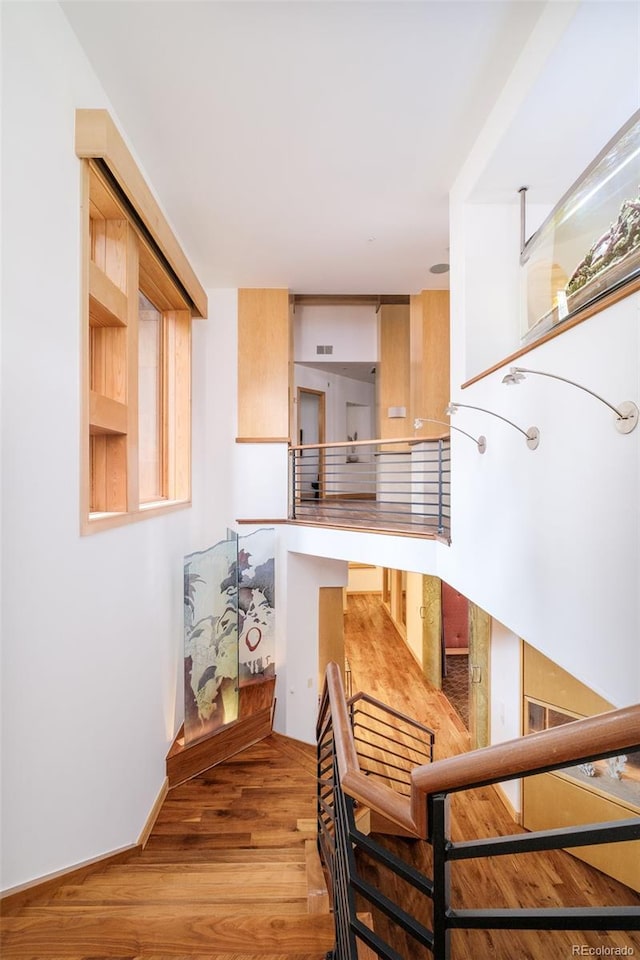 1070 Cypress Way, Castle Rock, CO 80108 - stairs with wood finished floors and baseboards