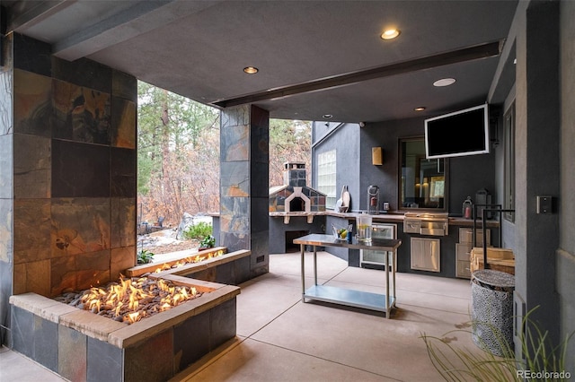 1070 Cypress Way, Castle Rock, CO 80108 - view of patio / terrace featuring a fire pit
