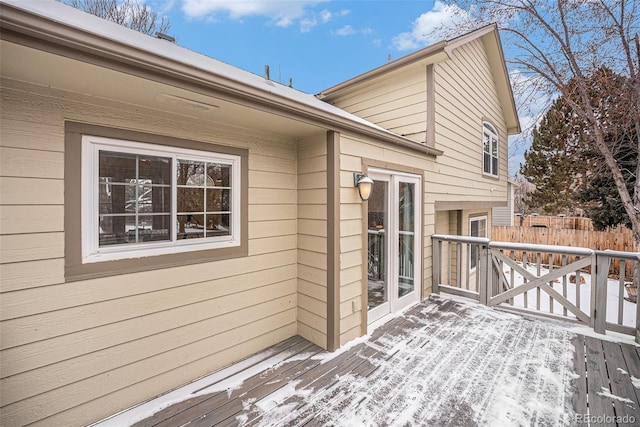 view of snow covered deck