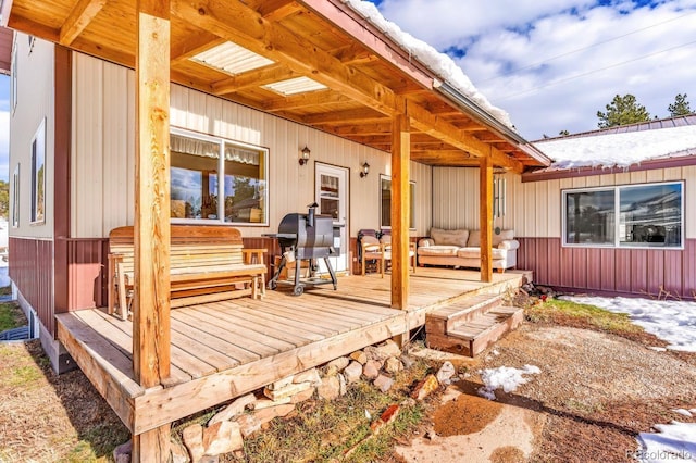 deck featuring an outdoor living space and grilling area