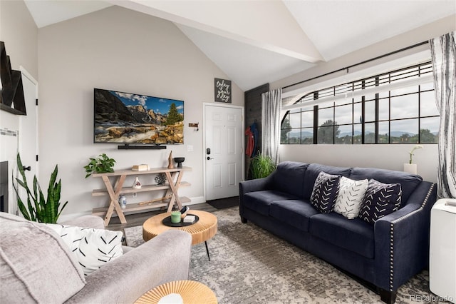 8311 S Upham Way Unit 1-207, Littleton, CO 80128 - living area with wood finished floors and high vaulted ceiling