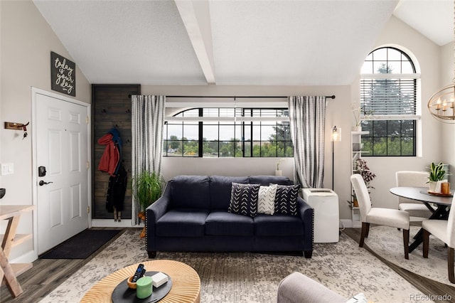 8311 S Upham Way Unit 1-207, Littleton, CO 80128 - living area featuring wood finished floors and a chandelier