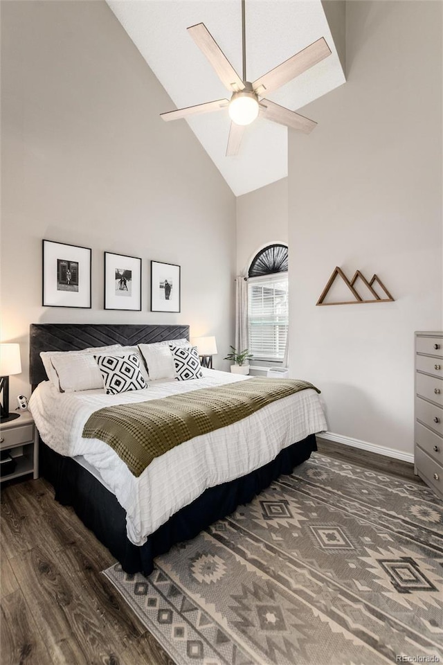 8311 S Upham Way Unit 1-207, Littleton, CO 80128 - bedroom with high vaulted ceiling, wood finished floors, and ceiling fan