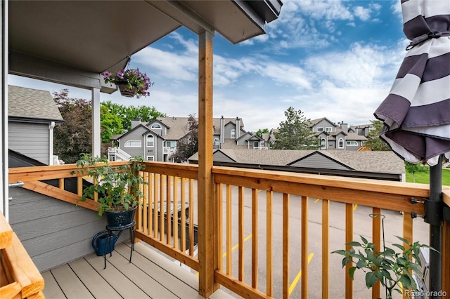 8311 S Upham Way Unit 1-207, Littleton, CO 80128 - wooden deck featuring a residential view