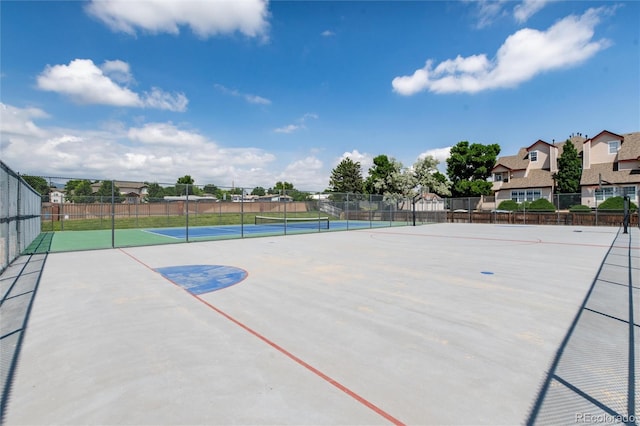8311 S Upham Way Unit 1-207, Littleton, CO 80128 - view of sport court featuring a tennis court and a residential view