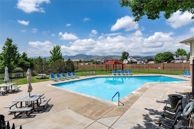 8311 S Upham Way Unit 1-207, Littleton, CO 80128 - community pool with a patio area and a mountain view