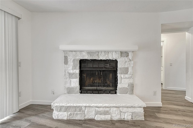 4283 S Salida Way Unit 8, Aurora, CO 80013 - detailed view of wood finished floors and a fireplace