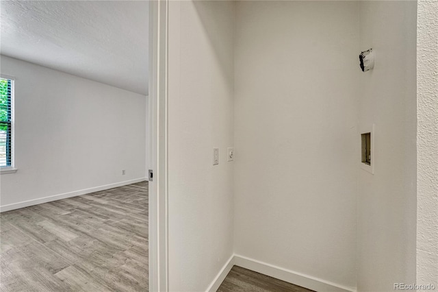 4283 S Salida Way Unit 8, Aurora, CO 80013 - laundry area with wood finished floors and washer hookup