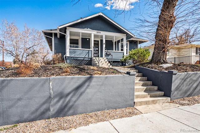 bungalow-style home with a porch